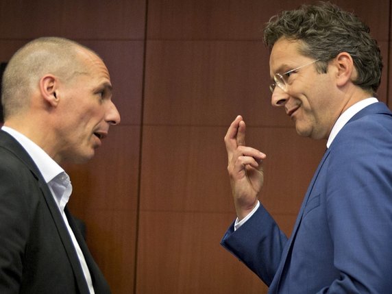 Le président de l'Eurogroupe Jeroen Dijsselbloem, à droite, et le ministre grec des Finances Yanis Varoufakis (Archives). © Keystone/AP/VIRGINIA MAYO