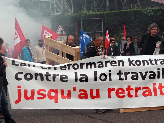 François Hollande et les syndicats campent sur leurs positions sur la réforme de la loi sur le travail. © KEYSTONE/AP/BOB EDME
