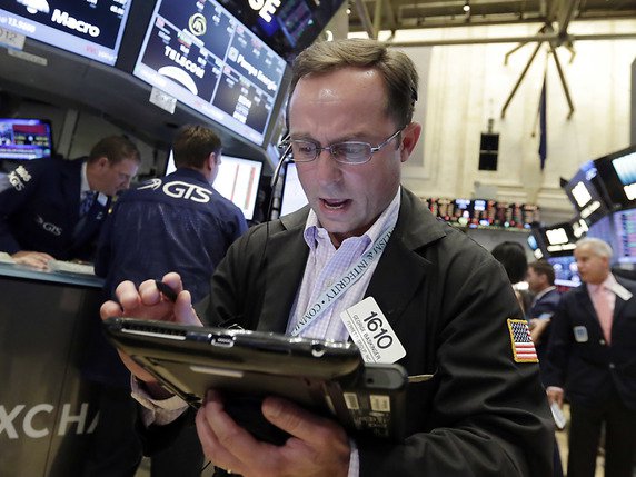 Les courtiers à la Bourse de New York sont déçus du PIB des Etats-Unis (archives). © KEYSTONE/AP/RICHARD DREW