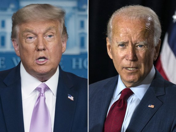 Donald Trump, à gauche sur le cliché, est en retard sur Joe Biden dans les sondages (archives). © KEYSTONE/AP