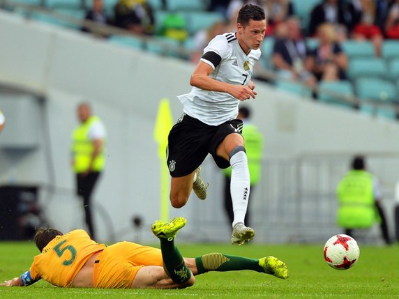 Le capitaine Julian Draxler a mené les siens à la victoire. © KEYSTONE/EPA/PETER POWELL