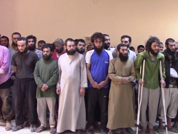 Des centaines de djihadistes de l'EI ont été faits prisonniers à Raqqa. © KEYSTONE/AP Furat FM