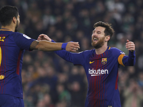 Suarez - Messi: duo de feu en Andalousie. © KEYSTONE/AP/MIGUEL MORENATTI