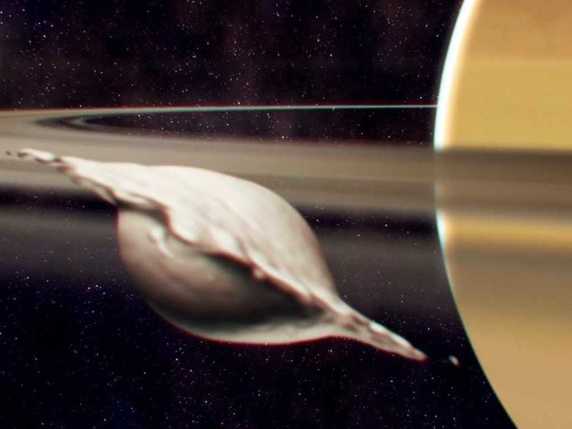 Atlas, une petite lune intérieure de Saturne, doit sa forme de ravioli à la collision et la fusion de deux corps de même taille. L'illustration la montre avant que sa réorientation sous l'effet des marées ne soit achevée. © Universität Bern/A. Verdier