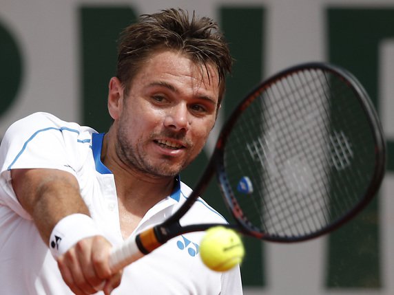 Stan Wawrinka a bien entamé son tournoi du Queen's © KEYSTONE/AP/CHRISTOPHE ENA