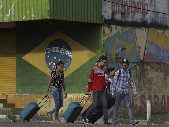 L'arrivée massive de Vénézuéliens fuyant la crise politique et économique dans leur pays a créé une situation délicate dans l'Etat brésilien frontalier de Roraima (archives). © KEYSTONE/AP/ERALDO PERES