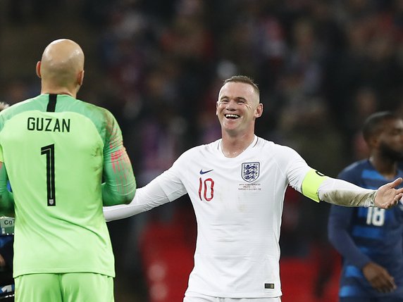 Wayne Rooney tout sourire, l'Angleterre a facilement battu les Etats-Unis © KEYSTONE/AP/ALASTAIR GRANT