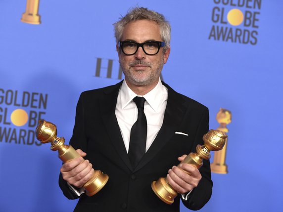 Le Mexicain Alfonso Cuaron a remporté le prix du meilleur réalisateur pour son film "Roma" qui avait décroché peu avant la récompense dans la catégorie meilleur film en langue étrangère. © KEYSTONE/AP Invision/JORDAN STRAUSS
