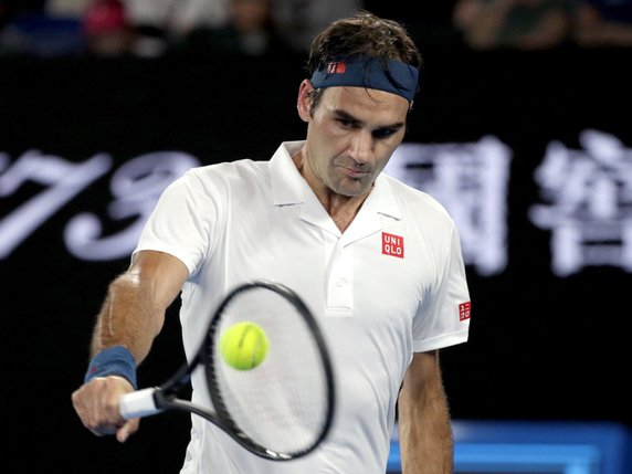 Un grand Roger Federer face à Taylor Fritz. © KEYSTONE/AP/KIN CHEUNG