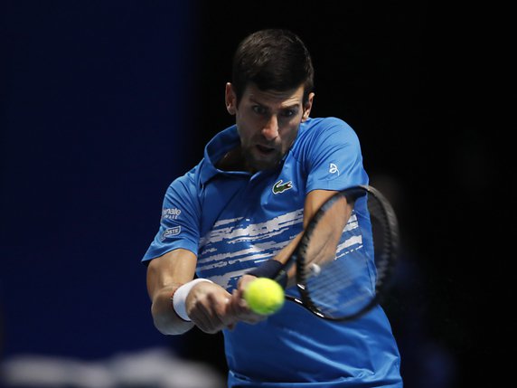 Djokovic n'a perdu que 3 jeux dimanche face à Berrettini © KEYSTONE/AP/ALASTAIR GRANT
