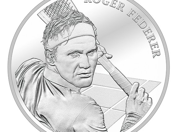 Une pièce commémorative en argent de 20 francs en l'honneur du champion. © KEYSTONE/SWISSMINT/BENJAMIN ZURBRIGGEN