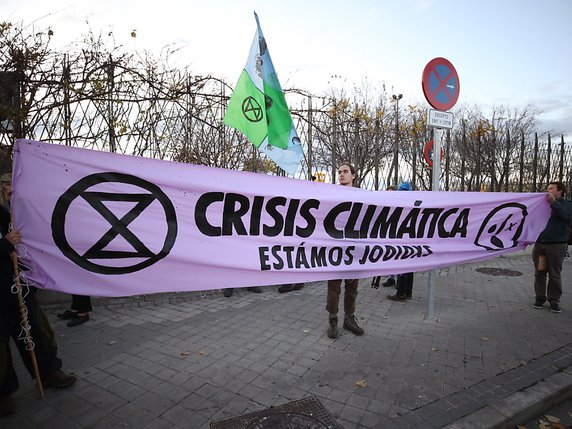 Une manifestation en marge de la conférence sur le climat de Madrid, qui se tient jusqu'au 13 décembre. © KEYSTONE/EPA EFE/JAVIER LIZON