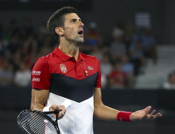 Pour Novak Djokovic, «si on arrive à des conditions qui affectent la santé des joueurs, je pense qu'on devrait vraiment envisager» de reporter l'Open d'Australie. © Keystone