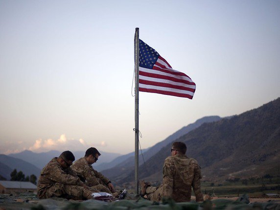 Les talibans négocient avec Washington un retrait des troupes américaines d'Afghanistan en échange notamment de garanties sécuritaires des insurgés, d'une réduction des violences et de l'ouverture d'un dialogue intra-afghan (archives). © KEYSTONE/AP/David Goldman