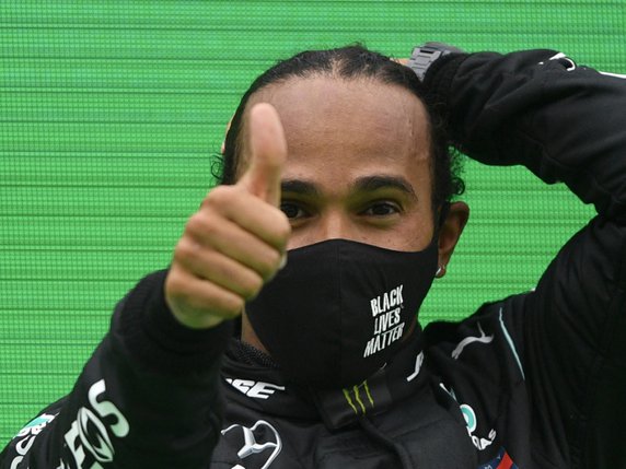 Lewis Hamilton est entré dans la légende au Portugla. © KEYSTONE/AP/Rudy Carezzevoli