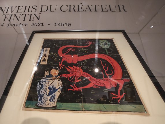 Un dessin d'Hergé pour la couverture de l'album de Tintin "Le Lotus bleu" a battu le record mondial d'enchères pour la bande dessinée. © KEYSTONE/AP/Michel Euler