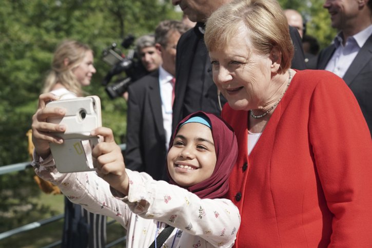 "Les jeunes gens nous rappellent que nous sommes trop lents", a concédé Angela Merkel (image d'illustration). © KEYSTONE/AP DPA/MICHAEL KAPPELER