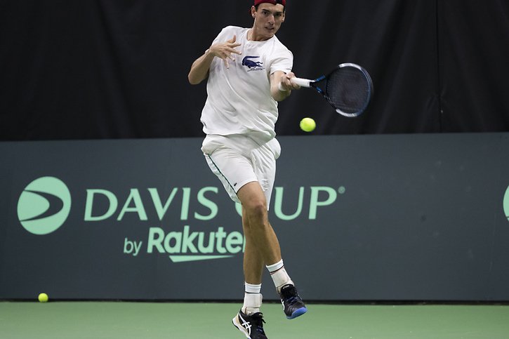 Marc-Andrea Hüsler (ici en Coupe Davis) a été sorti d'entrée à Wimbledon © KEYSTONE/PETER KLAUNZER