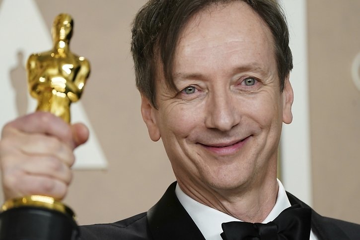 Volker Bertelmann a reçu cette année un Oscar pour la musique qu'il a composé pour le film "A l'Ouest rien de nouveau". © KEYSTONE/AP Invision/JORDAN STRAUSS
